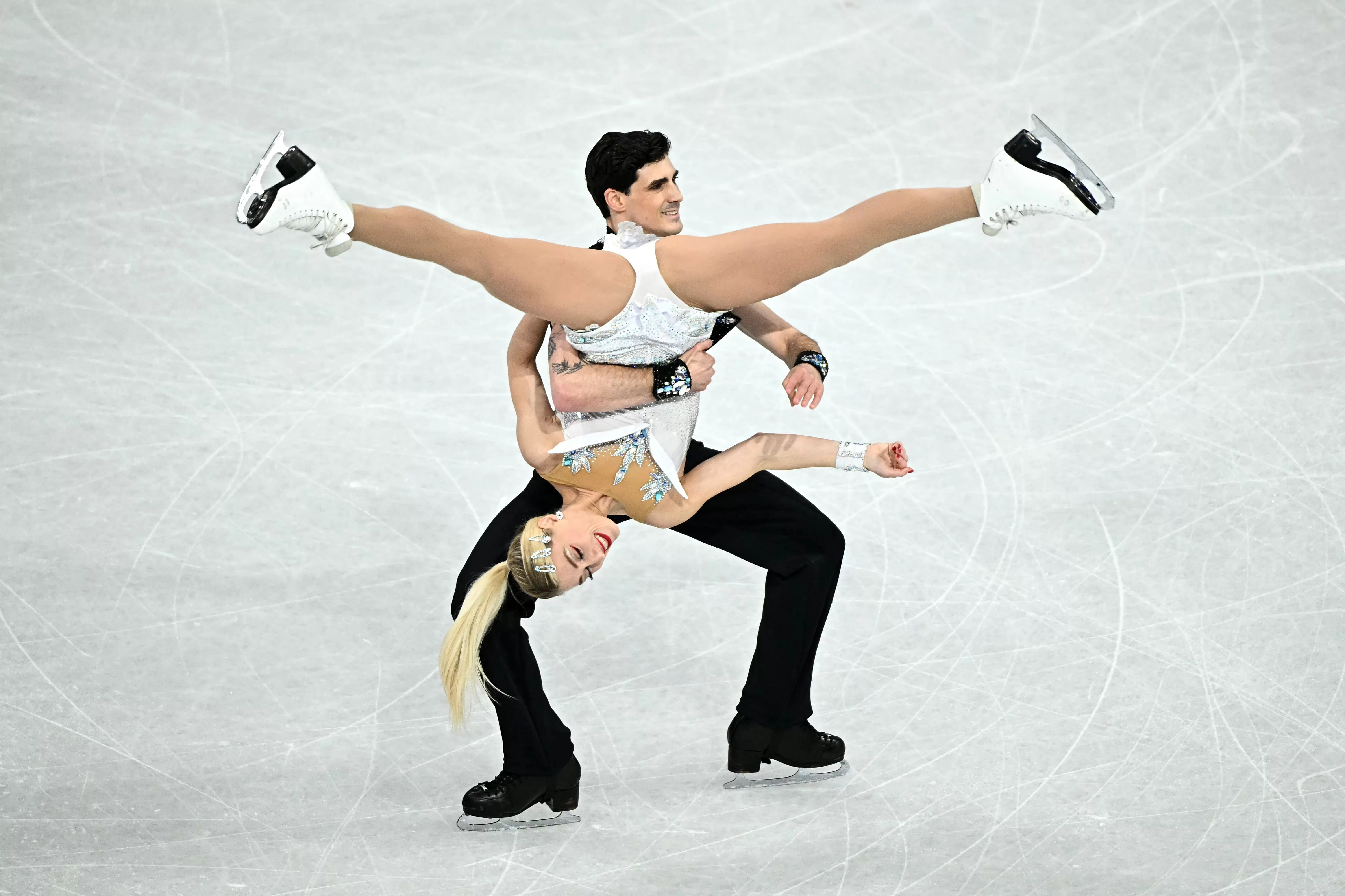 Figure Skater Executes Miraculous Save After Olympic Wardrobe Malfunction