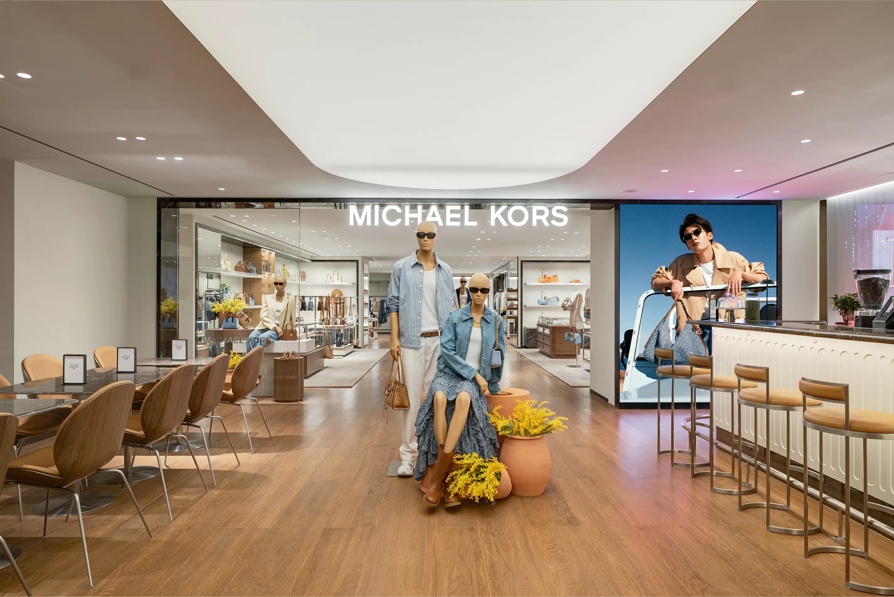 EXCLUSIVE: Michael Kors Opens New Beijing Store, Bringing Jet Set Lounge to Asia for First Time
